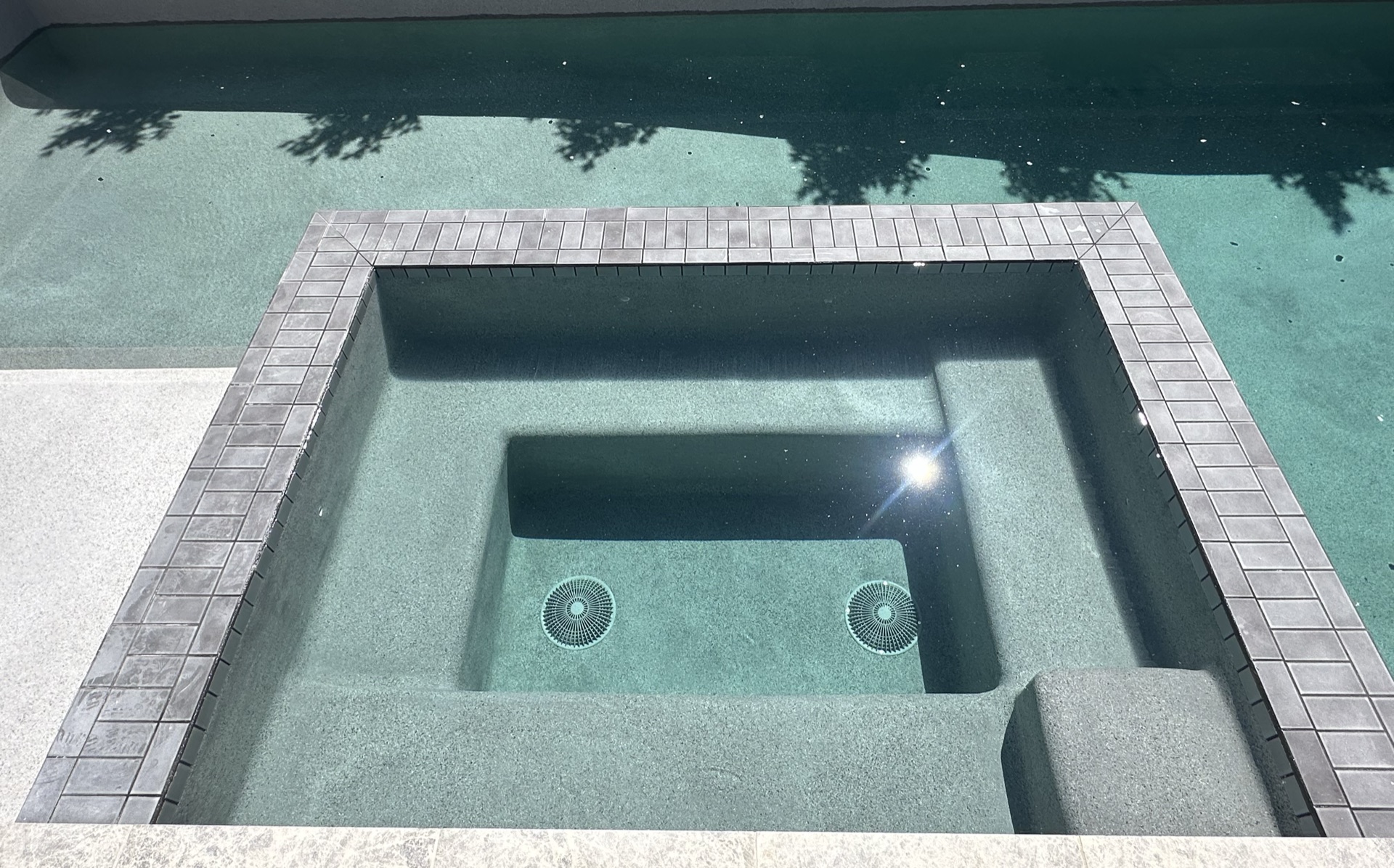 Pool sun shelf with bubbler jets - project near Fremont, CA
